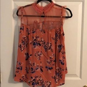 Floral sleeveless blouse with lace top detail